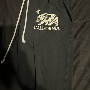 Reflex Black Joggers with Bear Tag